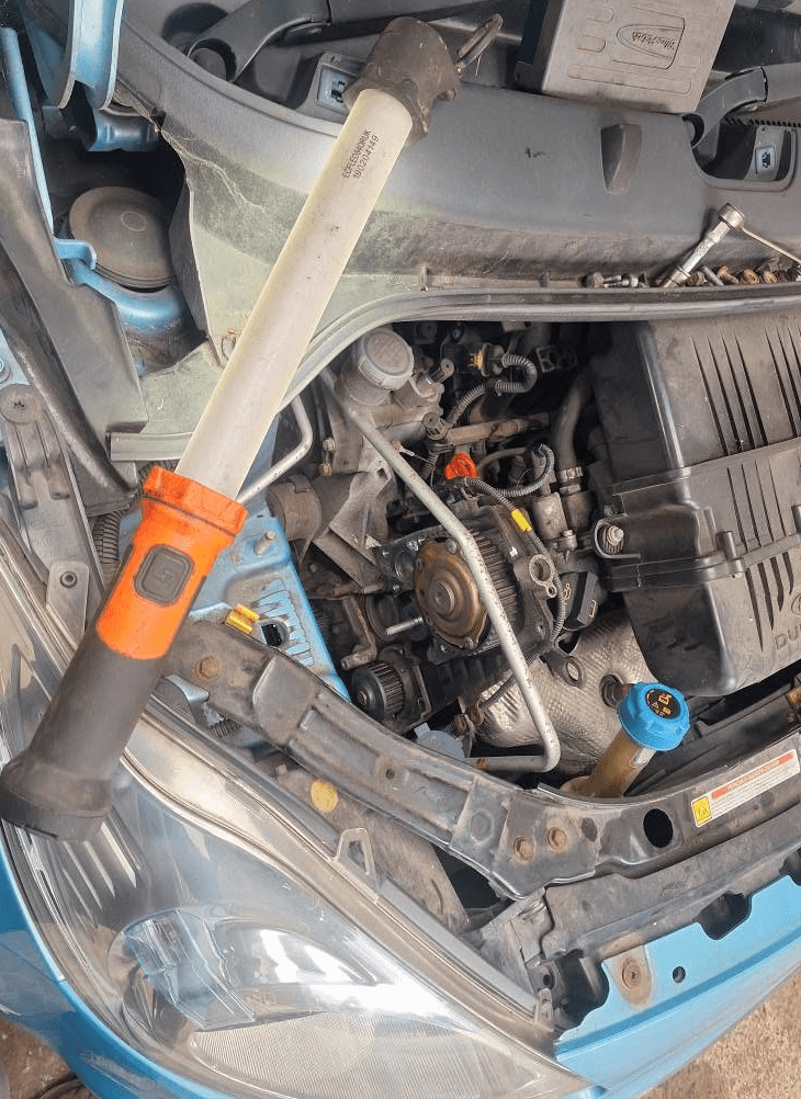 Mechanic working on a car